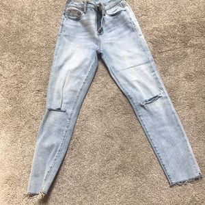 High rise skinny jeans w/ frayed bottoms